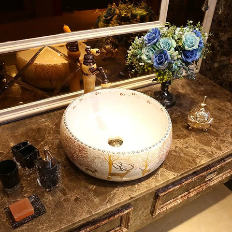 USZWBY Vessel Sinks Bathroom Vessel Sink Nordic Round Ceramic Washbasin Forest Art with faucet on countertop.