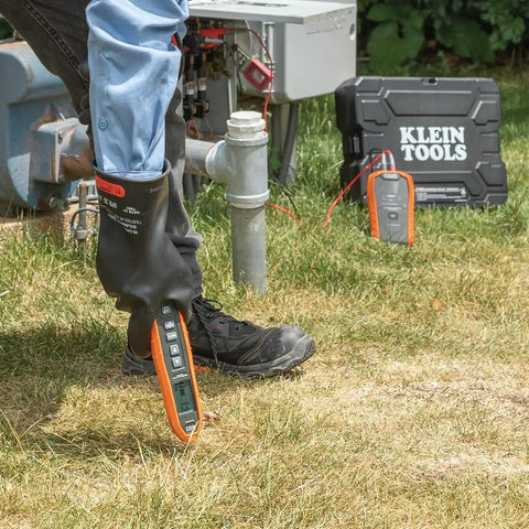 Person using Advanced Underground Circuit Breaker Finder And Wire Tracer Kit For Energized And Non Energized Breakers Fuses And Wires.