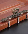 Vintage Style Antique Bronze Cabinet Pulls Handles 2 Pack Hollow Decor with screws on wood surface