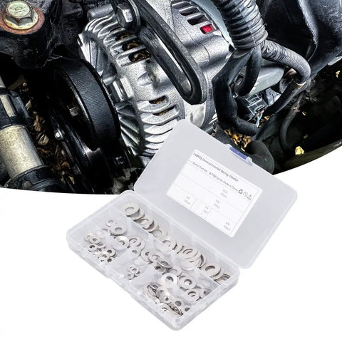 Badass 140 Piece Knurled Conical Spring Washers Kit 304 Stainless Steel Heavy Duty Serrated Locks For Car Repair And DIY Shops With M4 M5 M6 M8 M10 Sizes Keeps Bolts Tight Anti Rust Finish Built Strong So Machines Never Fail During Tough Grind Days. open case with assorted stainless spring washers beside car alternator