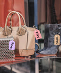 One Thousand Clear Three Inch Plastic Hang Tag Fasteners With Snap Lock Closure Secure Retail Clothing Label Pins No Fuss Durable Build For Jewelry Accessories And Hustle Shop Must Haves on sale tags attached to handbags and boots.