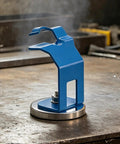 Heavy Duty Welding Magnetic Torch Holder With Strong Base For Secure Anti Slip MIG Torch Stand Precision Rack For Professional Workshop Use on a workbench.