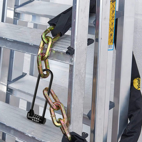 Beefy 4 Digit Padlock Set With 6.3 Inch Long Shackle Waterproof Resettable Code Lock securing a metal gate with a chain