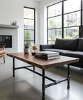 Industrial coffee table with Three Quarter Inch Cast Iron Pipe Fittings Set 30 Piece Kit in a modern living room setup.