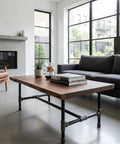 Modern living room with table using 10 Pack 1 Inch By 2 Inch Black Malleable Iron Pipe Nipples With Both Ends Threaded DIY Steampunk Industrial.