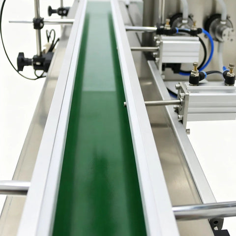 Heavy Duty Automatic Desktop Liquid Filler Quad Head Magnetic Pump No Sweat Setup Zero Drip Precision For Cosmetics And Beverages 8mm Nozzle With Tracking Conveyor 110V close-up of green tracking conveyor