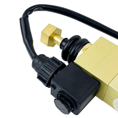 Close-up of a brass 5-Port Directional Control Valve With 30mm Solenoid And Manual Override for hydraulic and pneumatic use.