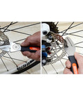 Using Disc Brake Pad Spreader Tool And Rotor Truing Fork For Bicycle Maintenance DIY Friendly Widen Pad Gap Align Calipers Release Pistons And True Rotors For Quick Easy Bike Repairs on wheel