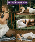 Beefy Rectangular Yoga Bolster For Deep Restorative Poses Ultra Firm Foam Core With Cotton Cover Handmade In The USA Black 25 In By 11 In By 5 In 5 Lb Restorative Pillow You Can Count On. woman using brown yoga bolster in reclined restorative poses outdoors