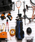 Heavy Duty PVC Slatwall Garage Organizer System 8 Ft By 4 Ft White Panels with assorted tools and sports gear