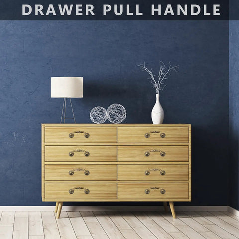 Wooden dresser with 4 Pack Vintage European Style Cabinet Drawer Pulls Antique Bronze Wardrobe Door Handles for home decor.