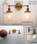 Vintage Industrial Wall Sconce With Switch 180 Degree Adjustable Hardwired Vanity Light With 5.9 Inch Globe Glass Shade In Antique Gold Two Light For Bathroom Living Room Kitchen, showing measurements and brass finish.