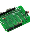 Arduino Screw Terminal Block Breakout Module For Uno R3 showing close-up of soldered 40-pin IDC header and reset switch