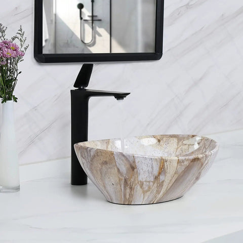 Oval Marble Vessel Sink With Pop Up Drain for above counter bathroom ceramic vessel sink with Nordic marbling design.