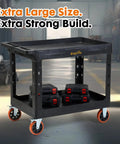 Extra Large Heavy Duty Utility Cart With Deep Shelves Two Tier Rolling Work Cart Plastic Service Cart On Six Inch Casters 550 Pound Capacity Black For Home Garage Shop, loaded with tools in workshop.