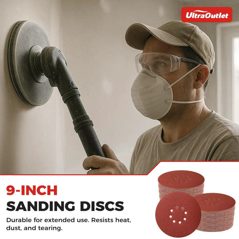 Person using Pro Grade 70 Pack 9 Inch Sanding Discs Hook And Loop Self Stick 8 Hole for drywall sanding, includes assorted grits.