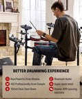 Man playing an electronic drum set with Bluetooth and Melodics lessons, 450 sounds, USB MIDI, 5 pads, 3 cymbals, mesh snare