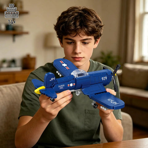 Teen assembling the WW2 Military Airplane Building Kit Featuring F4U Corsair Fighter Jet Model Set With 562 Pieces.