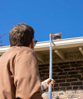 Person using Expandable Inspection Mirror On A Pole For Roofs Gutters Ductwork Under Vehicle And Car Inspections Retractable Security Mirror
