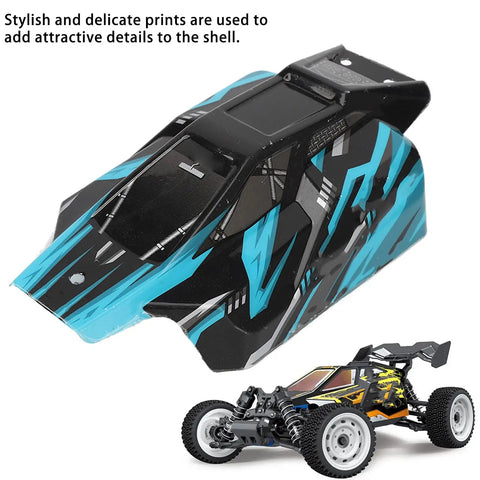 Blue and black protective shell with graphic design for RC buggy, displayed at an angle