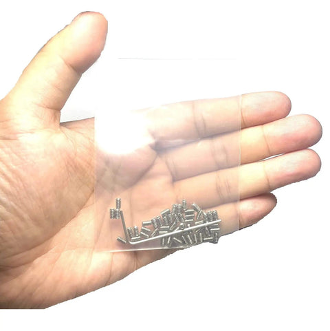 Hand holding a pack of 50 Piece 4-40 By 3/16 Inch Stainless Steel Hex Socket Set Screws With Allen Head And 1.27mm Allen Wrench