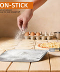 Baker using aluminum peel to prepare pizza dough with eggs, cheese, and toppings, featuring Must Have Pizza Peel Set With Cutter Rocker.