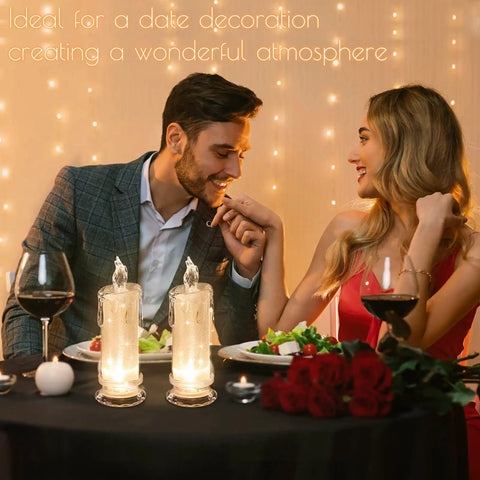 Couple dining with set of 4 white LED flameless pillar candles, 2.5 inch diameter by 7 inch tall, battery operated.