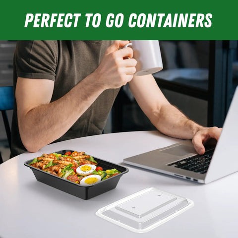 Person with laptop eating from 32 Oz Meal Prep Containers Set, 50 Pack Reusable Food Storage Pans with Easy Open Lids, Black