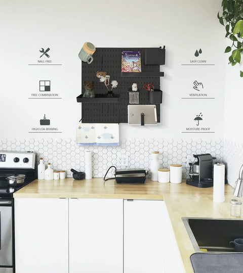 Kitchen wall with Pegboard Organizer Kit With 13 Accessories No Punching 22X22 Inch Wall Mount for neat utensil storage.