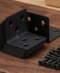 12 Pack L Shape Mounting Brackets With Screws Cold Rolled Steel Right Angle Corner Braces For Furniture Shelves And Drawers Beefy Heavy Duty Shelf Support And No Hassle Install Hardware Kit black brackets with screws on wood surface