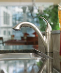 Camerist One-Handle Pullout Kitchen Faucet with Reflex Docking and Power Clean Spray Chrome Finish in modern kitchen setting