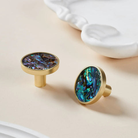 Pearl Shell Cabinet Knobs With Abalone Inlay, Slick Brushed Gold Zinc Alloy Drawer Pulls display on a beige surface