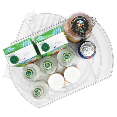 Top view of Refrigerator Square Lazy Susan Turntable Organizer with groceries, clear and non-slip, 16.5 by 11.1 inches.