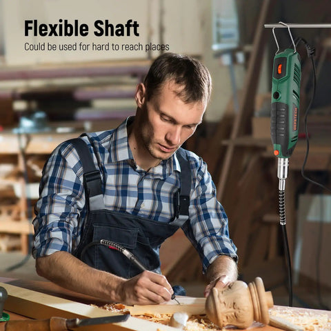 Man using Pro Grade Rotary Tool Kit 180W Power With 6 Speeds Up To 40000 RPM And Variable Speed Universal Keyless Chuck And Flex Shaft 128 Accessories for carving.