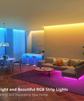 65.6 Foot Ultra Long RGB LED Strip Lights with remote in living room setup showcasing color changing ambiance.