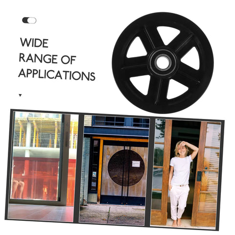 Heavy Duty Barn Door Roller Wheel Set Featuring Smooth Steel Casters For Sliding Gates And Windows High Load Rigid Track Hardware Built Like A Tank And Rust Resistant For Effortless Indoor Outdoor Setup showing a black steel roller wheel.