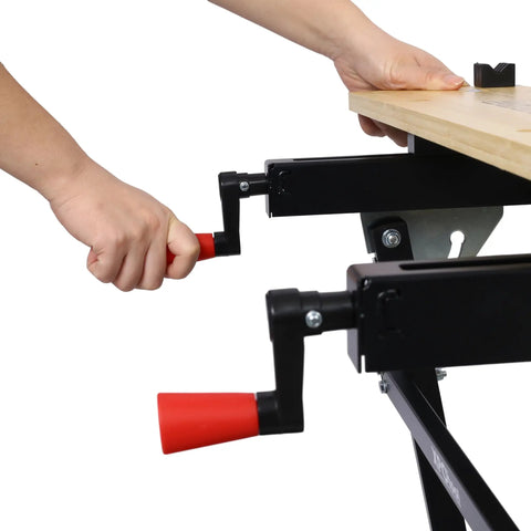 Person adjusting the vise on the Hella Tough Portable Workbench Featuring A Heavy Duty Vise Foldable Work Table Holding Up To 550 Pounds.