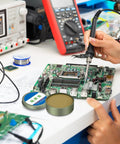 Technician soldering motherboard using Pro Grade No Clean Solder Flux Paste for Electronics and PCBs, Fast Flow Control and Wetting.
