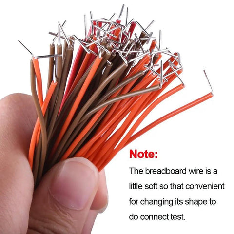 Hand holding 560 Piece Jumper Wire Kit With 14 Lengths Of Assorted Preformed Breadboard Wires, Male To Male 24 AWG U Shaped Jumpers