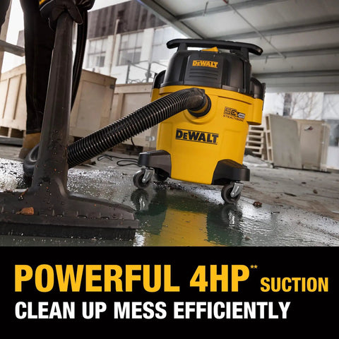 Yellow Stealthsonic 5 Gal Wet Dry Shop Vacuum 4 HP Ultra Quiet Cleaner in workshop on wet floor.