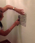 Person applying Knockdown Texture Drywall Repair Tool For DIY Pros And Homeowners Fast And Easy Environment Friendly No Aerosol Spray Reusable And Cost Effective Pro Grade Patch System For Wall Repair on wall.