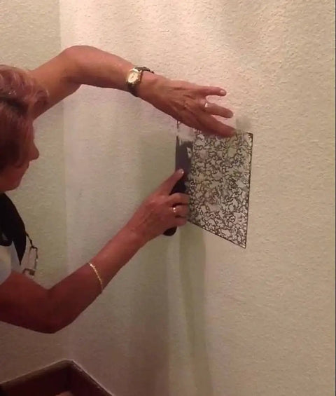 Person applying Knockdown Texture Drywall Repair Tool For DIY Pros And Homeowners Fast And Easy Environment Friendly No Aerosol Spray Reusable And Cost Effective Pro Grade Patch System For Wall Repair on wall.