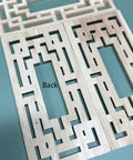 Back view of Four Piece Set Of Top Notch Wood Appliques Featuring Slick Floral Carvings for DIY furniture updates.