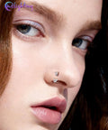 Close-up of woman wearing 20G Butterfly Horseshoe Nose Ring Hoop With Push Pin Ends Taper Ball Grabber Tool 316L Surgical Steel