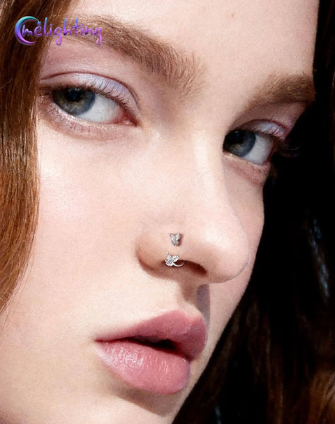 Close-up of woman wearing 20G Butterfly Horseshoe Nose Ring Hoop With Push Pin Ends Taper Ball Grabber Tool 316L Surgical Steel
