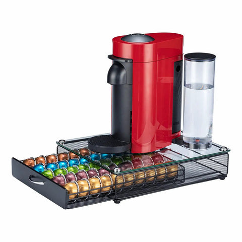 Neat And Tidy 50 Pod Vertuo Capsule Holder With Crystal Tempered Glass Top, holding Nespresso Vertuo pods, with coffee maker on top.