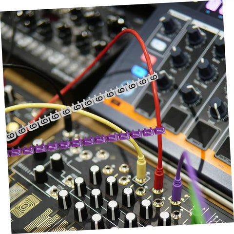 Gotta Keep Your Desk Or Garage Slick With These 150 Piece Digital Number Wire Label Tubes used on colorful audio cables in a recording setup.