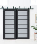 Veregio 7602 interior barn bypass sliding doors with frosted glass and solid wood in black modern style 84 by 96 inches installed in room