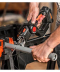 Close-up of 20V Cordless 2 In 1 Reciprocating Saw And Jigsaw With Tool Free Blade Swap cutting steel pipe.
