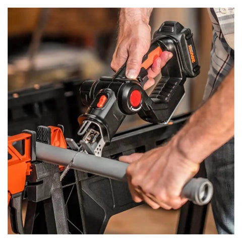 Close-up of 20V Cordless 2 In 1 Reciprocating Saw And Jigsaw With Tool Free Blade Swap cutting steel pipe.